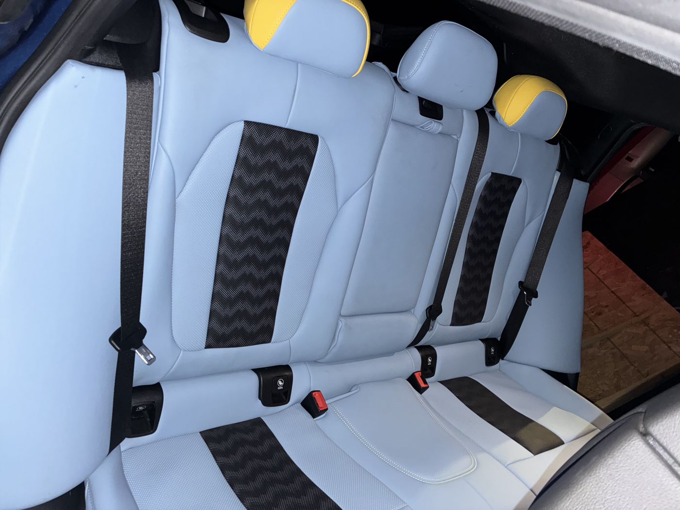 Gray rear seats with black and yellow inserts