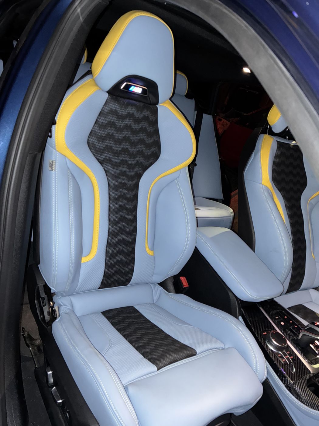 Gray front seats with black and yellow inserts
