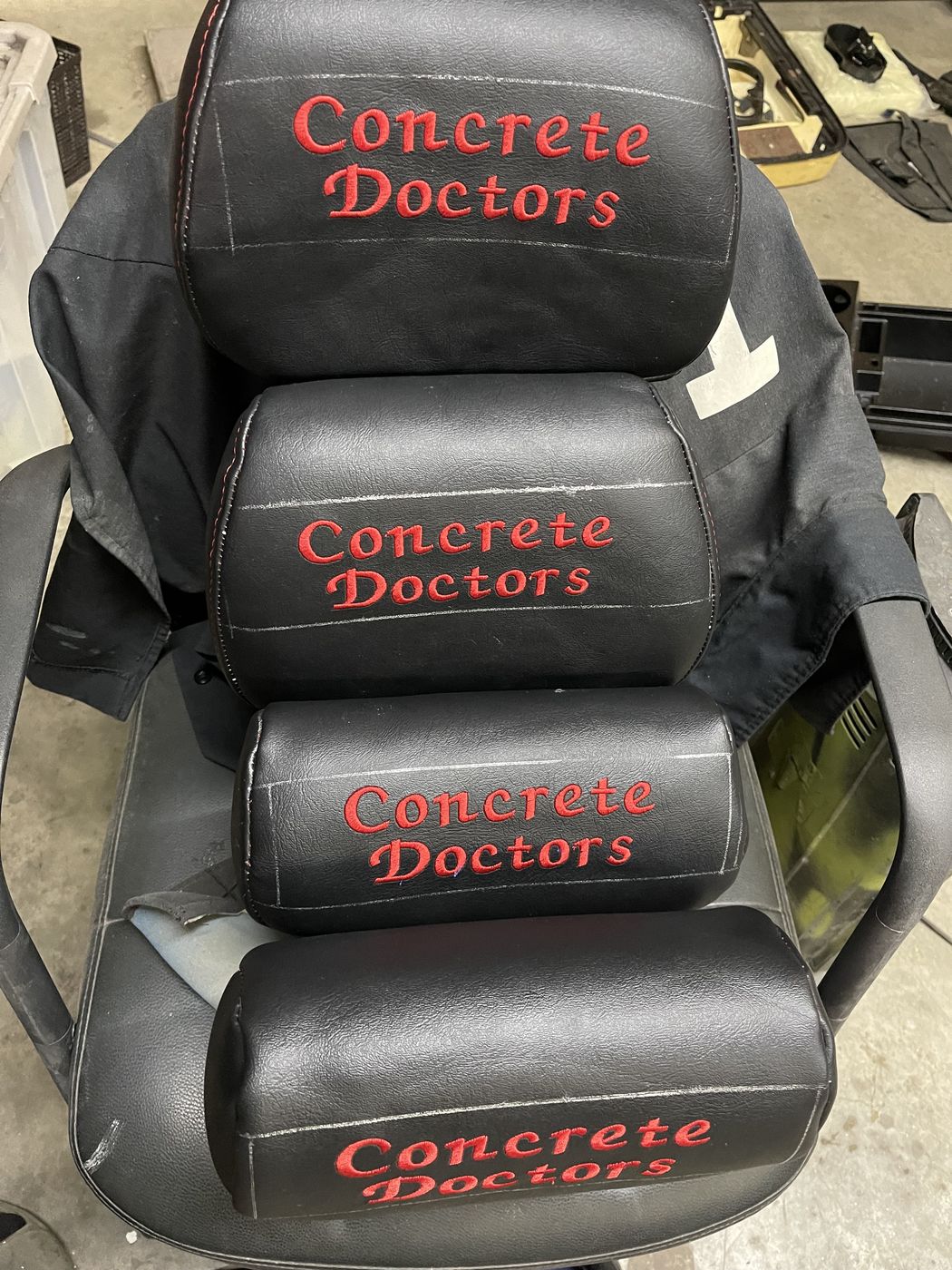 Seat and headrests embroidered with a custom logo