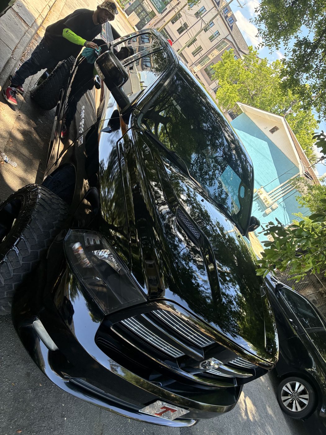 Black car with a fresh paint finish