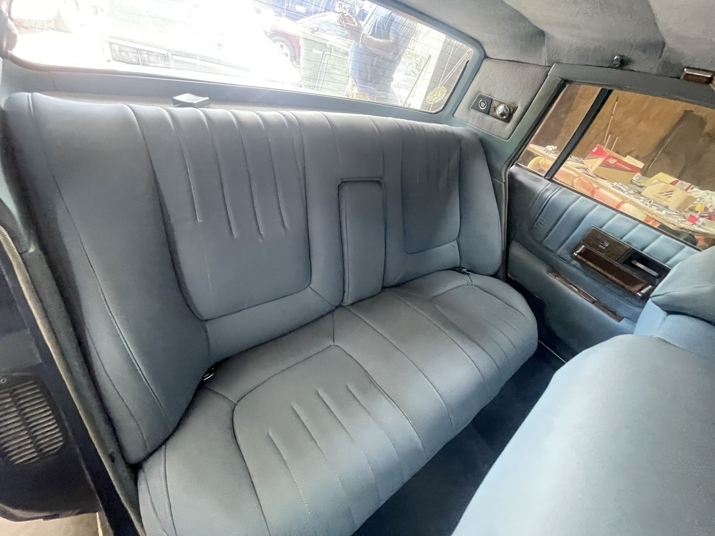 Light blue leather rear bench in a classic car
