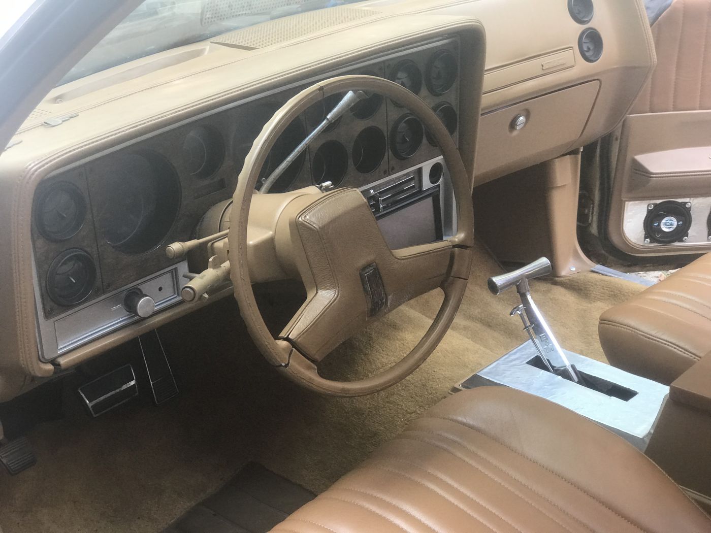 Tan interior and dash in a classic car