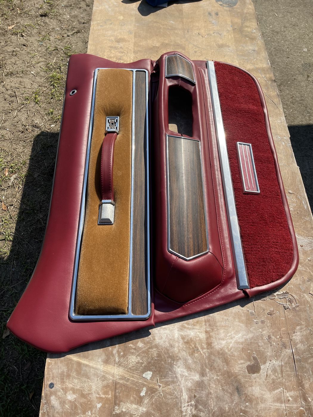 Red and woodgrain door panel
