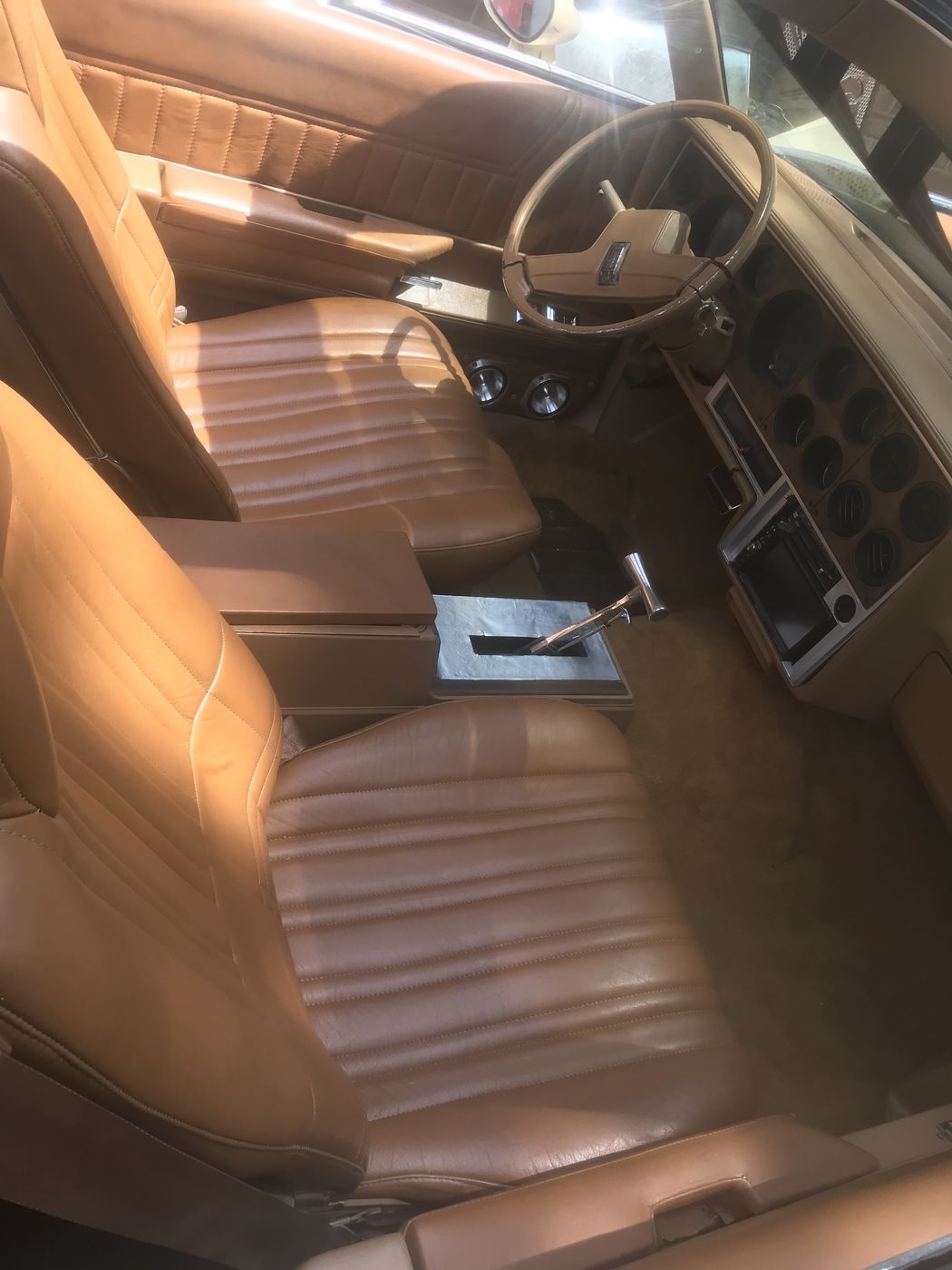 Saddle leather bench seat in a classic car